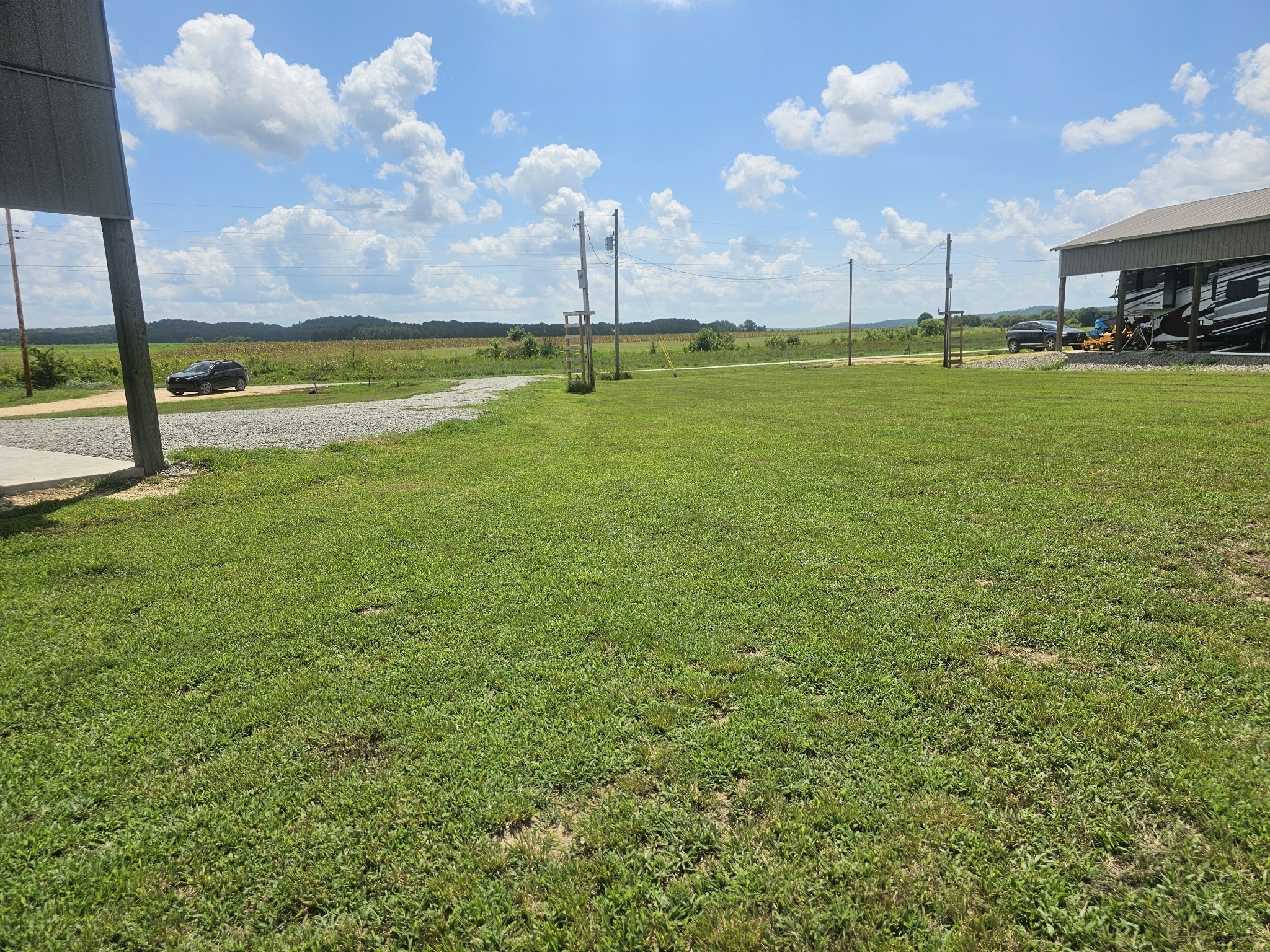 2271 Hardin Bottom River Road Clifton, TN 38425 - Photo 9 of 21 a view of a large body of water with lots of buildings in the background