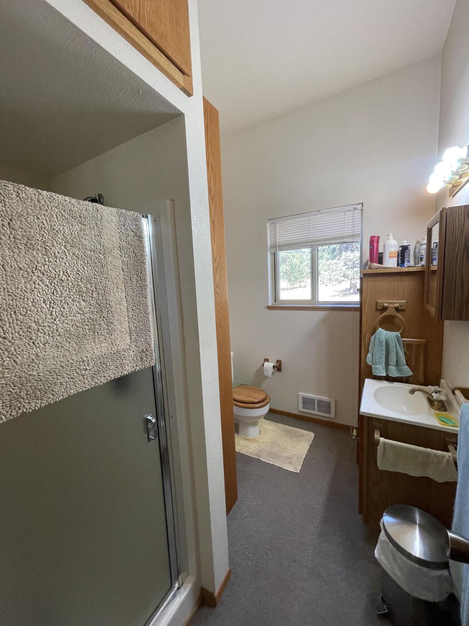 19761 Buck Canyon Road Bend, OR 97702 - Photo 30 of 33 Workshop/Hobby room full bath