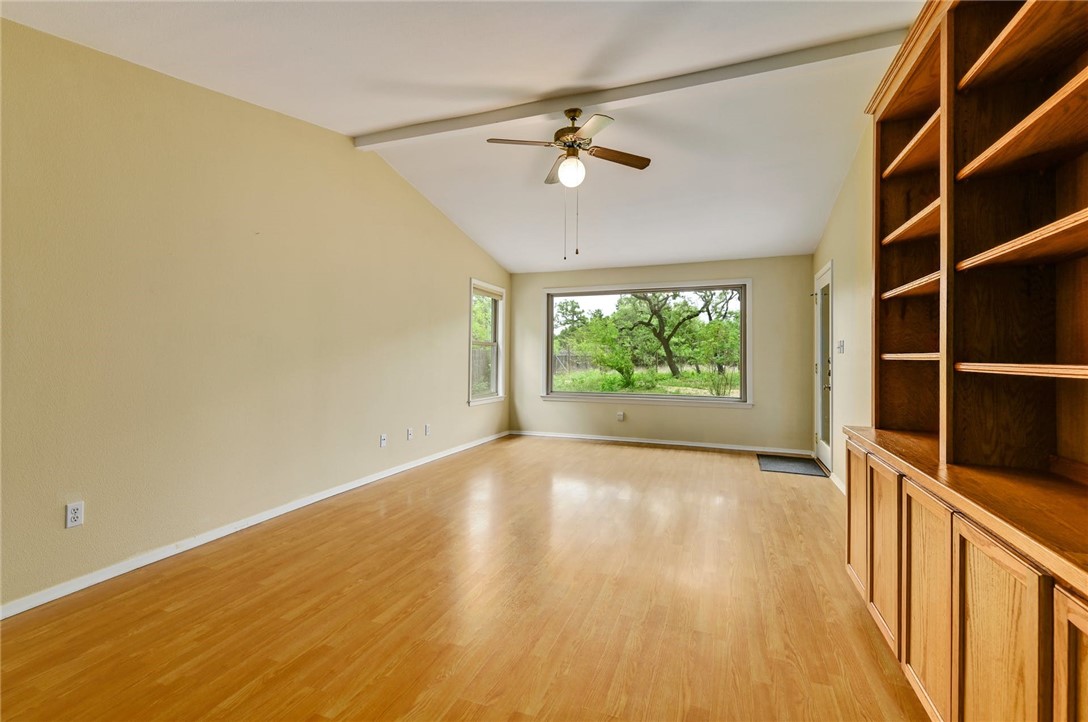 901 Valley View Drive Austin, TX 78733 - Photo 15 of 25 wooden floor in an empty room with a window