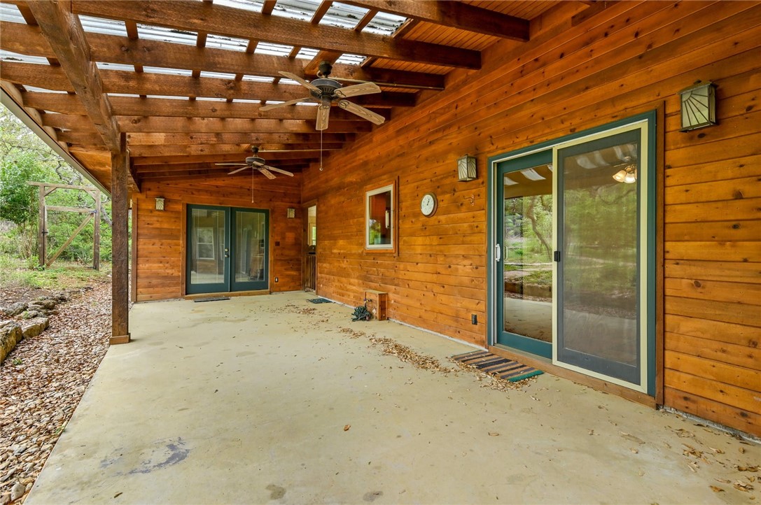 901 Valley View Drive Austin, TX 78733 - Photo 21 of 25 a view of a room with wooden walls