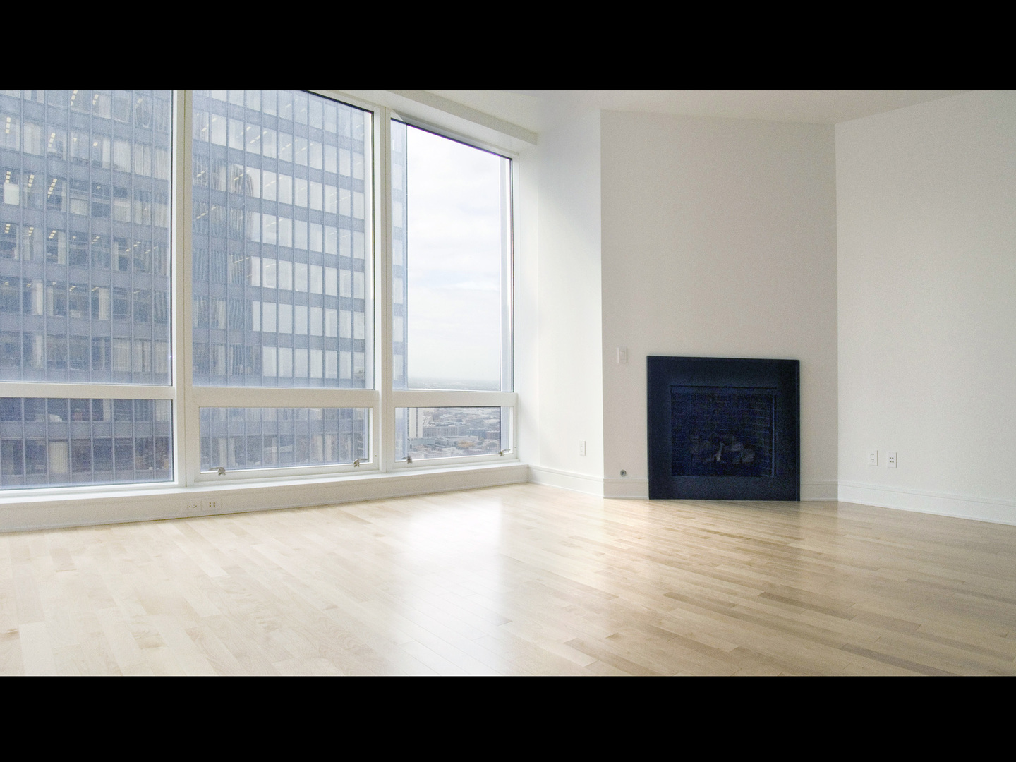 Undisclosed Address Chicago, IL 60611 - Photo 7 of 15 a view of an empty room with a window
