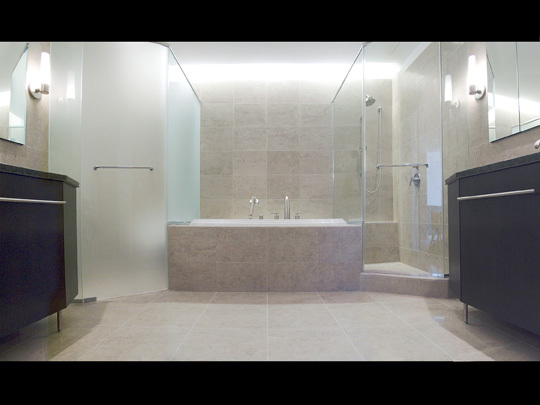 Undisclosed Address Chicago, IL 60611 - Photo 10 of 15 a view of bathroom with bathtub and shower