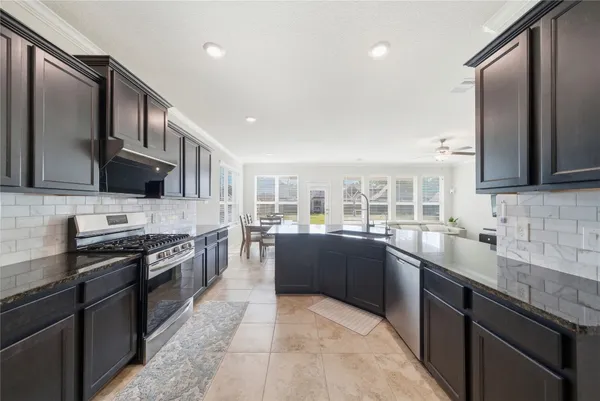 a bedroom with a bed and dresser