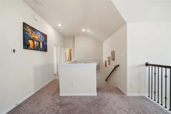 a bathroom with a glass shower door and a bathtub
