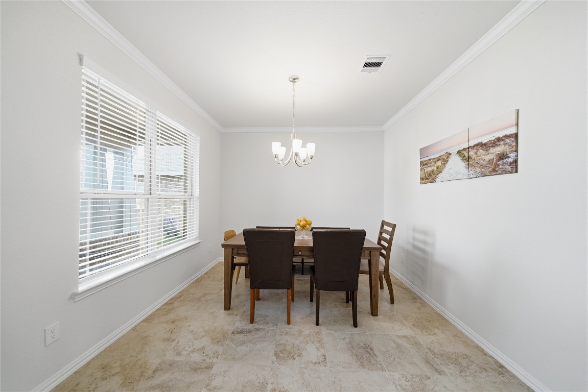 4335 Tawny Timber Drive Spring, TX 77386 - Photo 6 of 42 a view of a dining room with furniture window and outside view