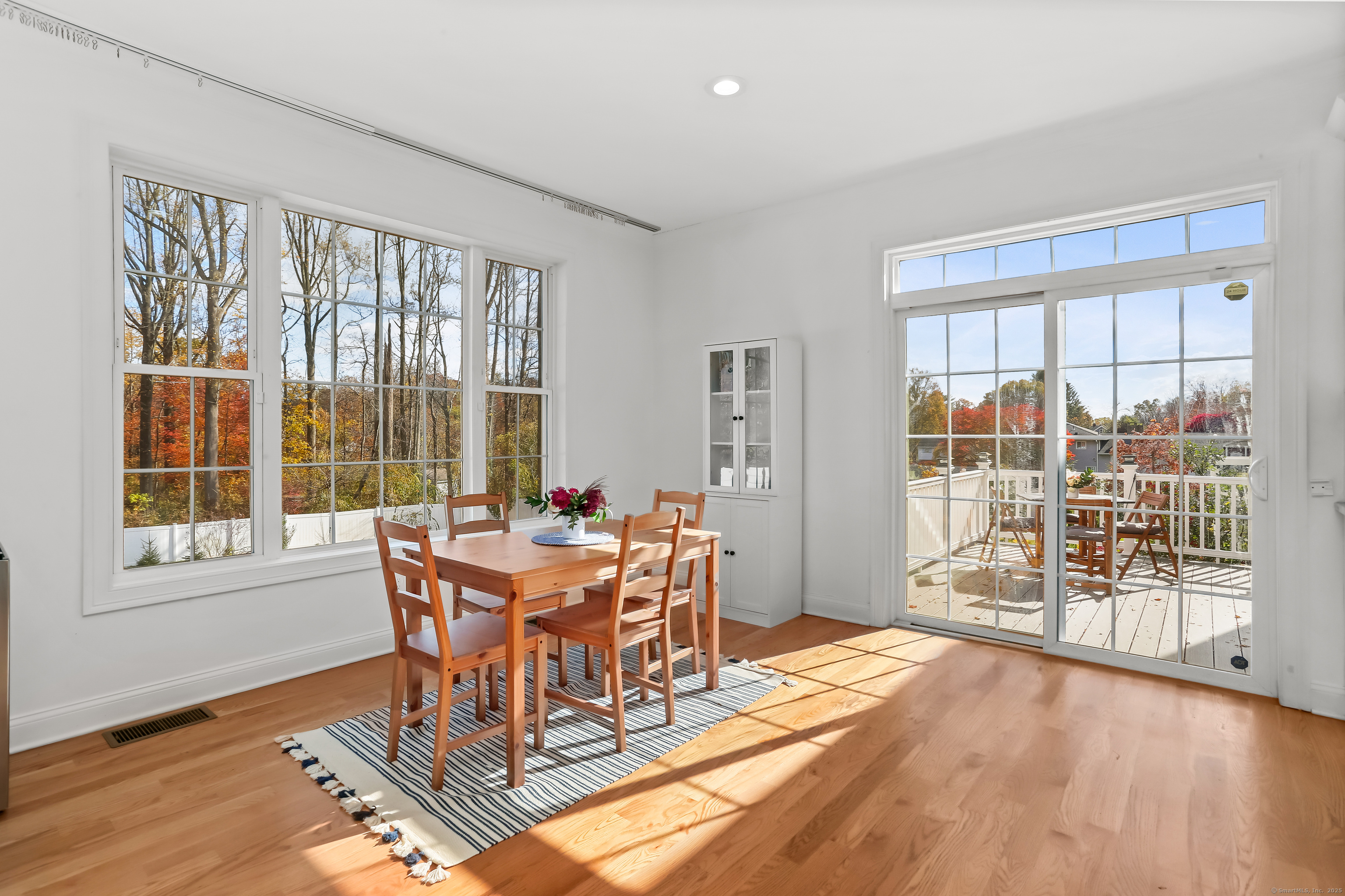 450 James Farm Road Stratford, CT 06614 - Photo 13 of 36 a view of a dining room with furniture window and wooden floor