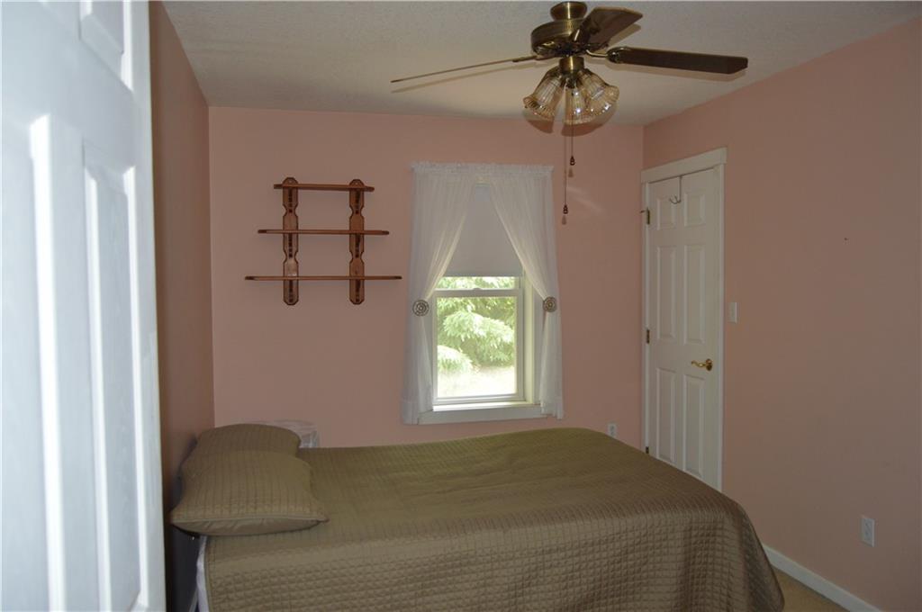 3244 Maple Lane Jamestown, PA 16134 - Photo 15 of 27 a bedroom with a bed and a window