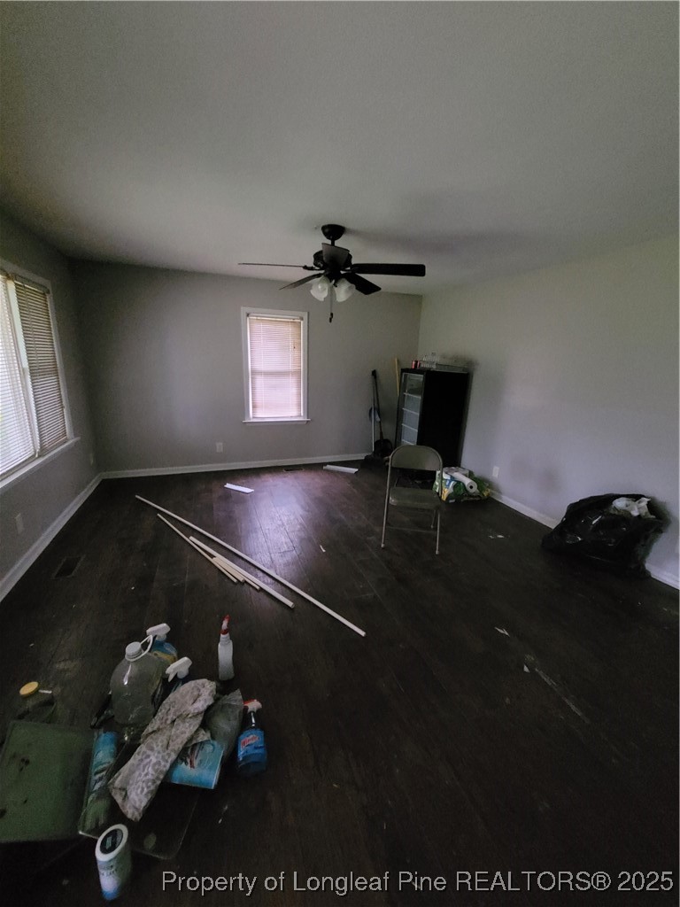 599 Haws Run Road Jacksonville, NC 28540 - Photo 14 of 43 wooden floor in a hall with a window