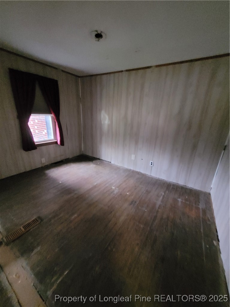 599 Haws Run Road Jacksonville, NC 28540 - Photo 30 of 43 a view of an empty room with a fireplace