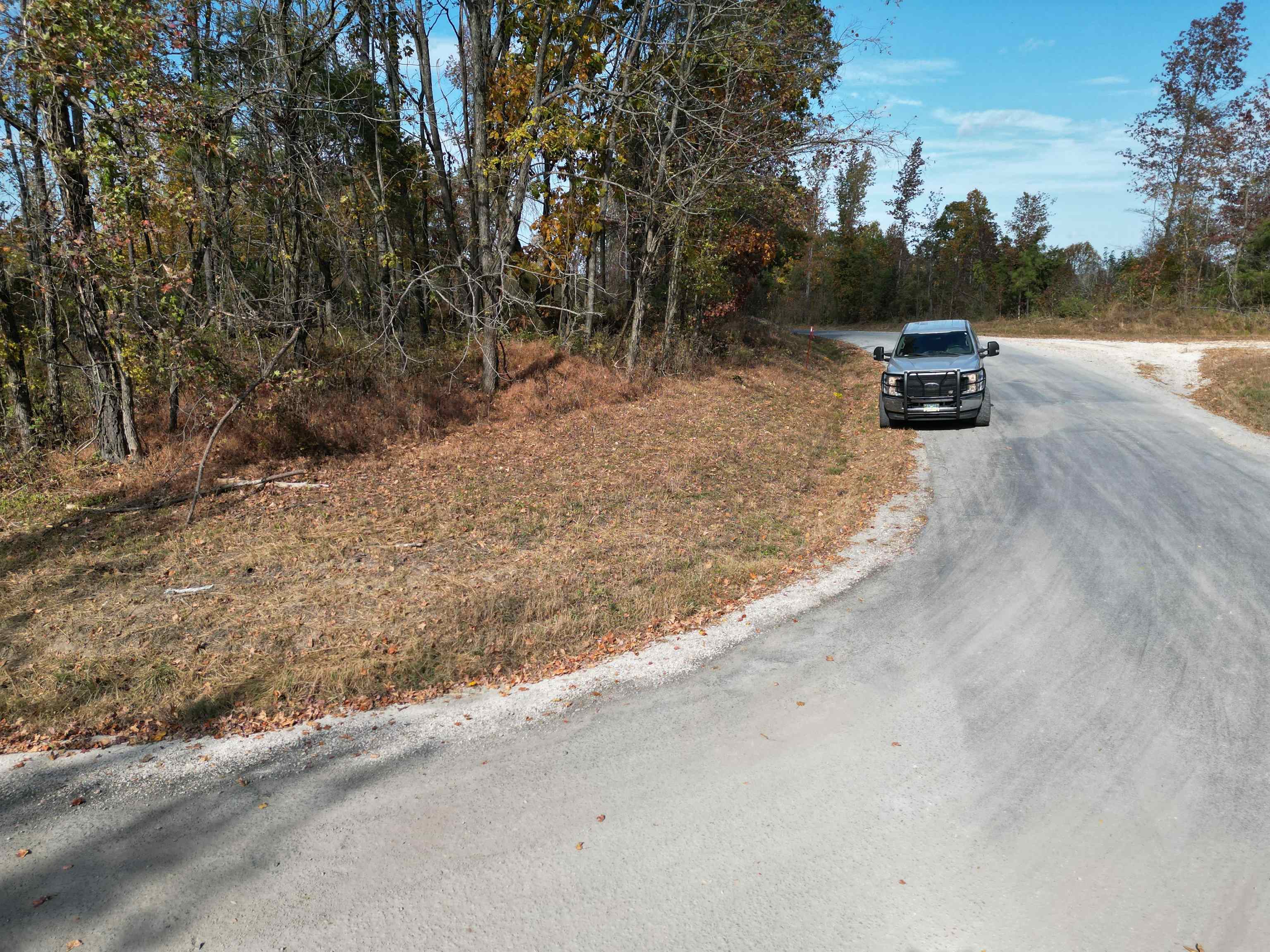 Tract 3 Purdy Road Huntingdon, TN 38344 - Photo 10 of 10 a car parked on the side of a road