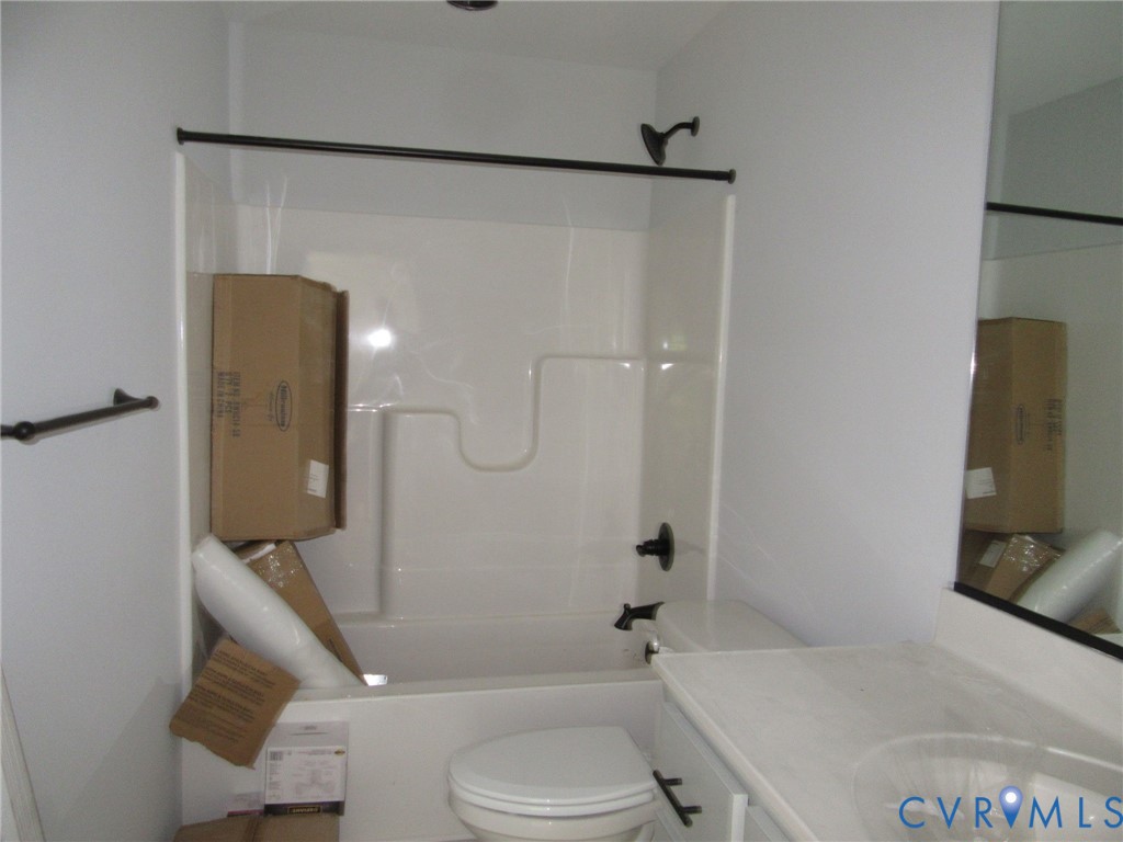 Lot 5 White Oak Church Road Wilsons, VA 23894 - Photo 15 of 17 a bathroom with a toilet and a shower
