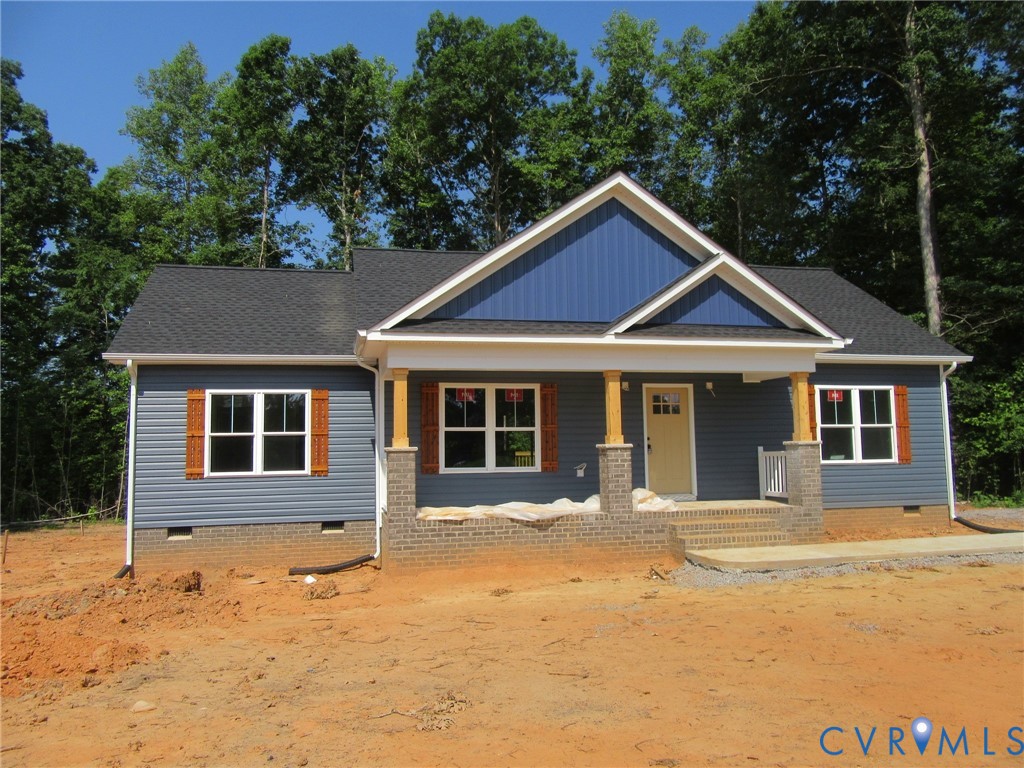 10314 White Oak Church Road Wilsons, VA 23894 - Photo 5 of 21 a front view of a house with a yard