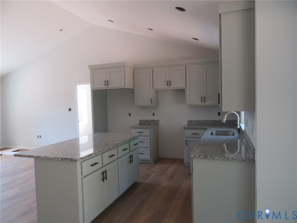 Lot 5 White Oak Church Road Wilsons, VA 23894 - Photo 7 of 17 a kitchen with stainless steel appliances granite countertop a sink stove and refrigerator