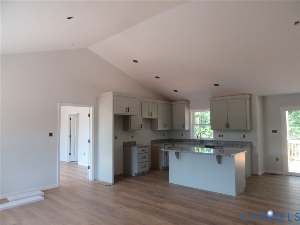 10314 White Oak Church Road Wilsons, VA 23894 - Photo 8 of 21 a kitchen with stainless steel appliances a refrigerator and a stove top oven