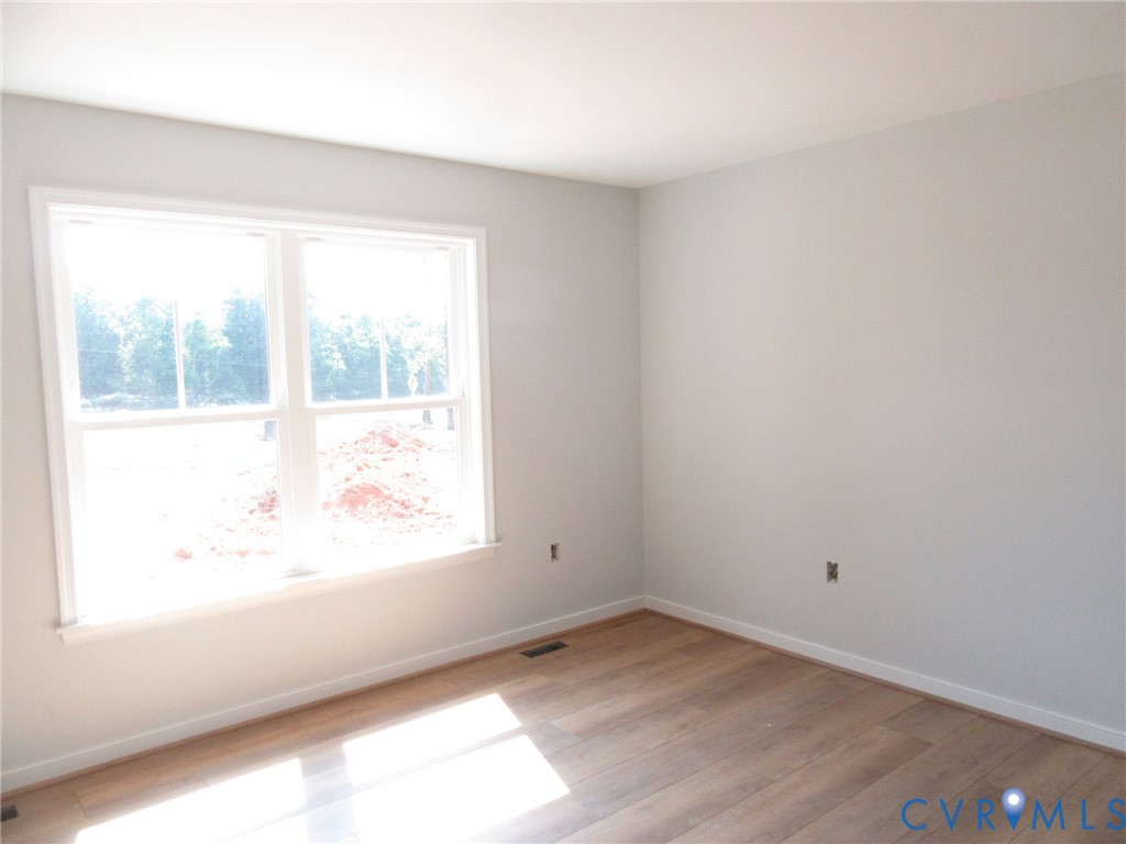 Lot 5 White Oak Church Road Wilsons, VA 23894 - Photo 10 of 17 an empty room with a window