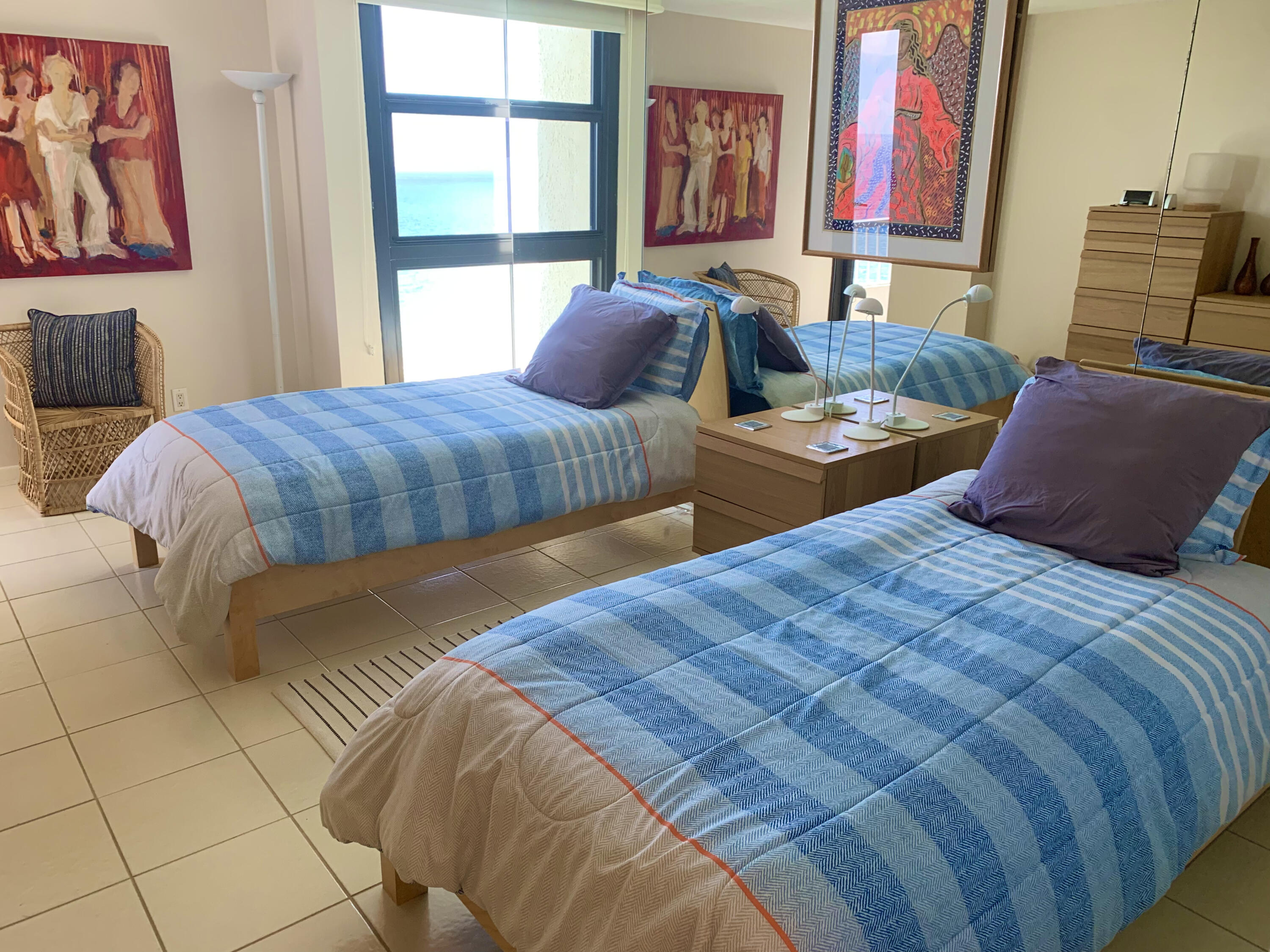 5540 North Ocean Drive, Unit PHA Riviera Beach, FL 33404 - Photo 20 of 42 a bedroom with double bed and a window