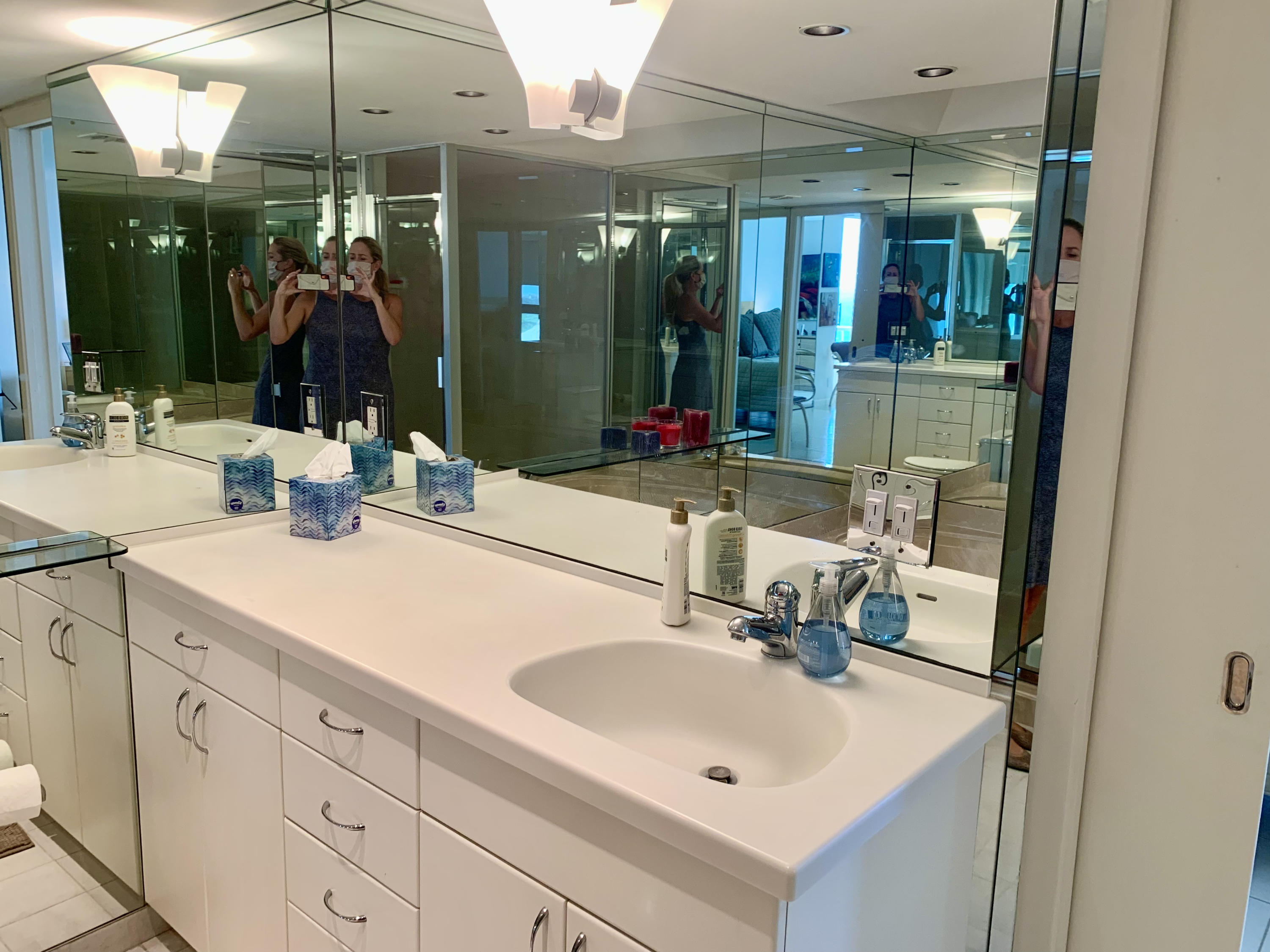 5540 North Ocean Drive, Unit PHA Riviera Beach, FL 33404 - Photo 27 of 42 a bathroom with a sink and a mirror