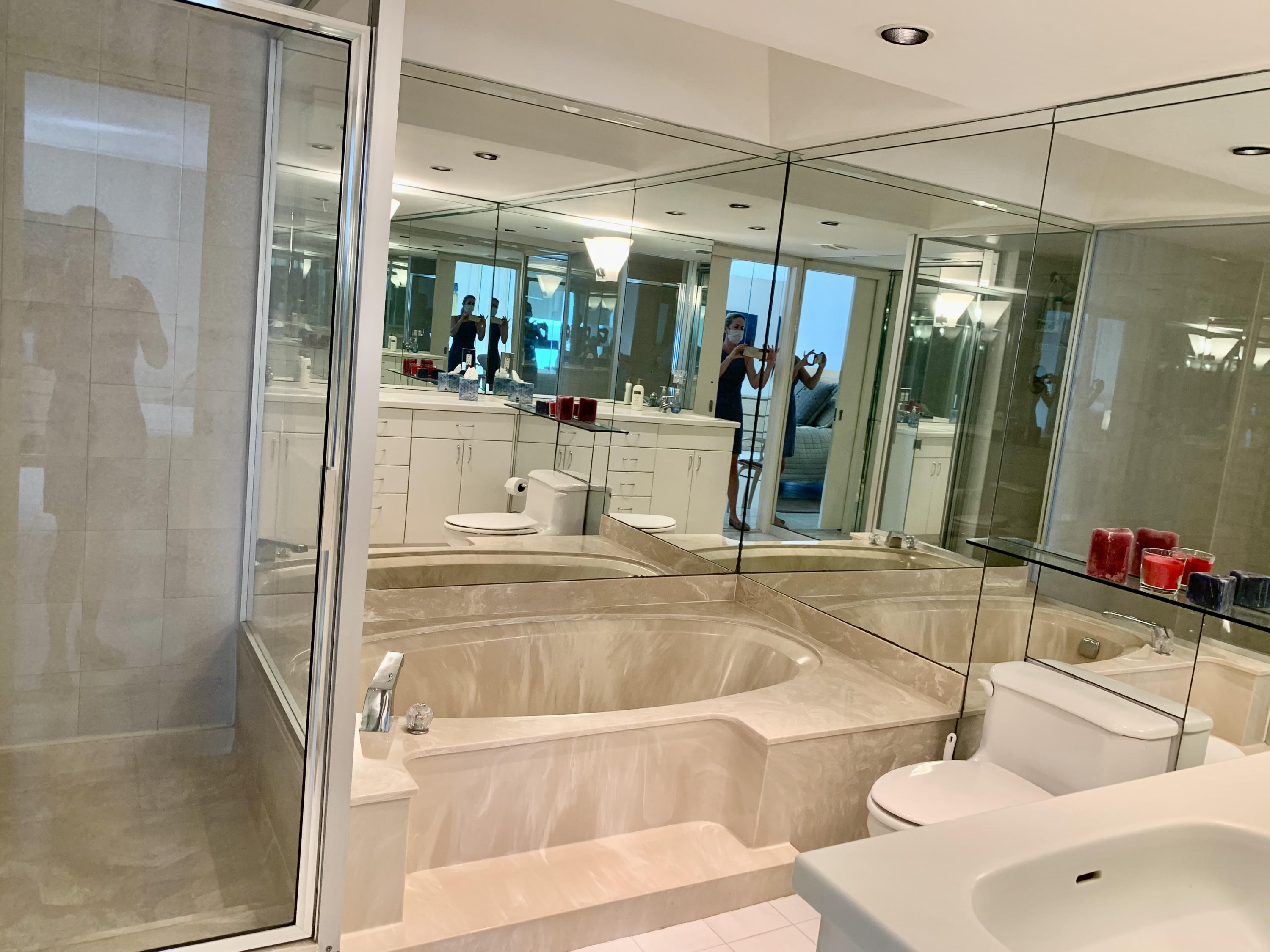 5540 North Ocean Drive, Unit PHA Riviera Beach, FL 33404 - Photo 28 of 42 a view of a bathroom with a tub and shower