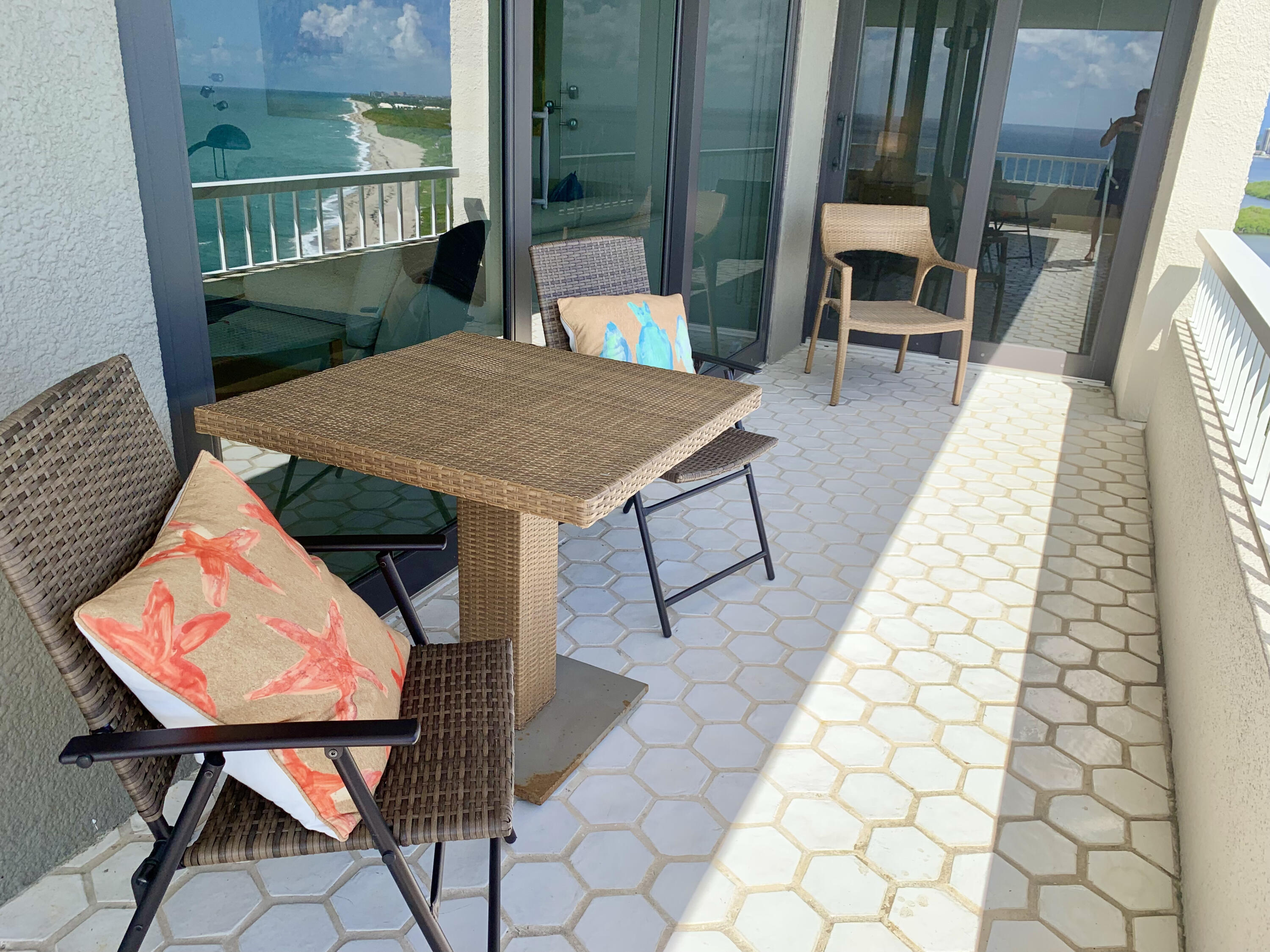 5540 North Ocean Drive, Unit PHA Riviera Beach, FL 33404 - Photo 33 of 42 an outdoor space with furniture
