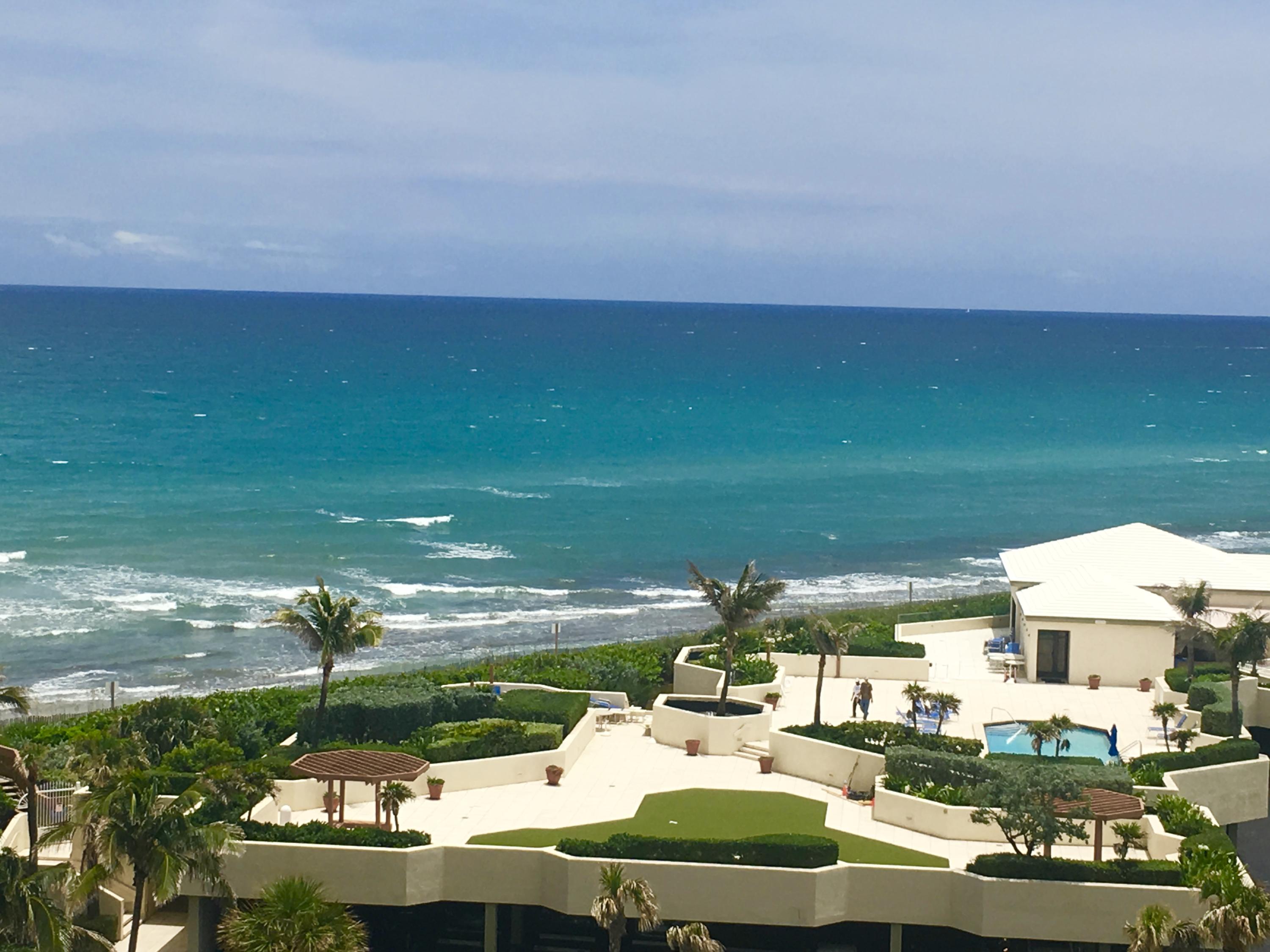 5540 North Ocean Drive, Unit PHA Riviera Beach, FL 33404 - Photo 42 of 42 a front view of a house with a yard