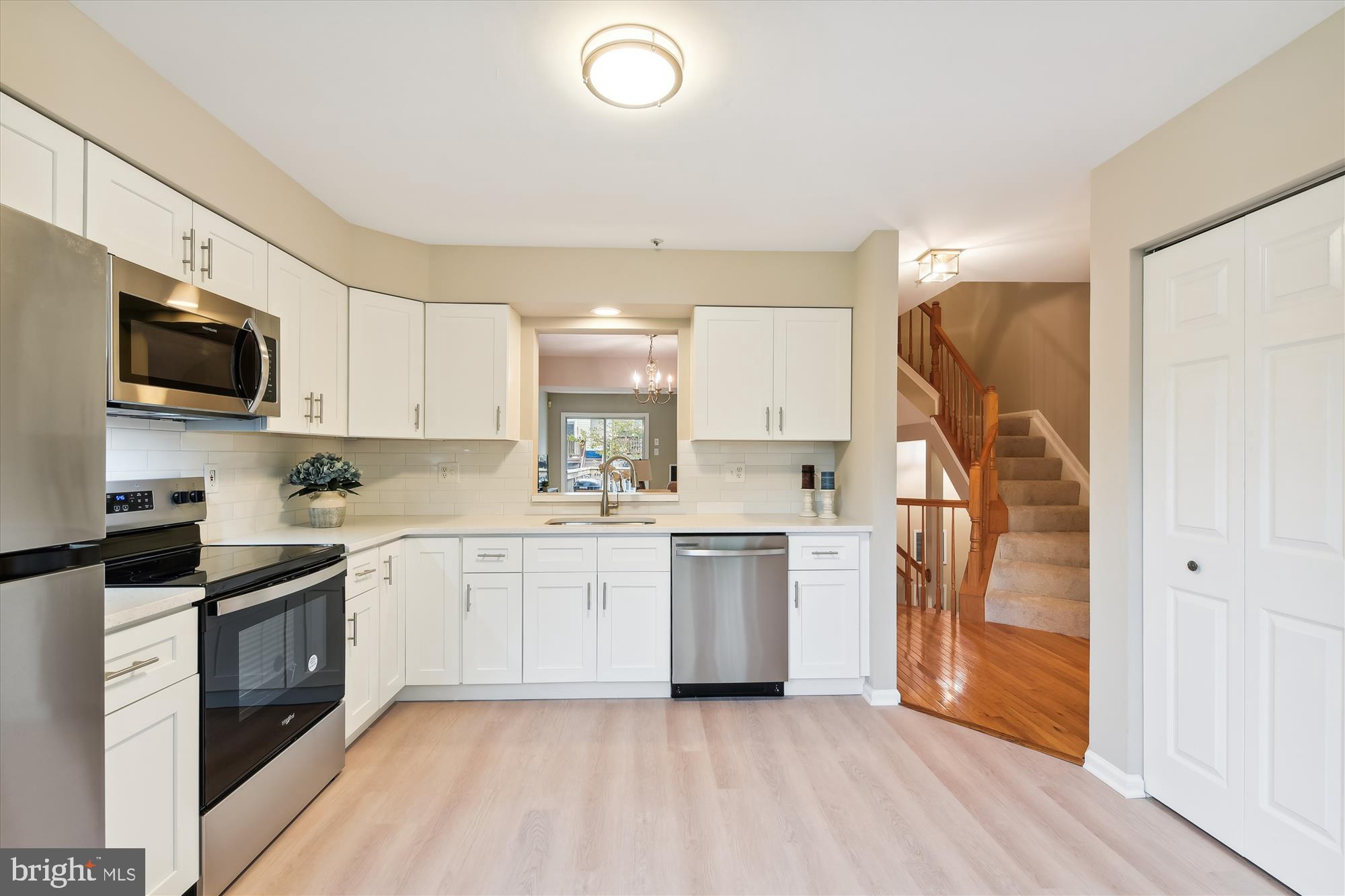 3023 Beech Bottom Road Laurel, MD 20724 - Photo 10 of 56 New bright, white cabinets and quartz countertops