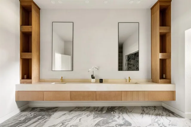 a bathroom with a bathtub and a sink