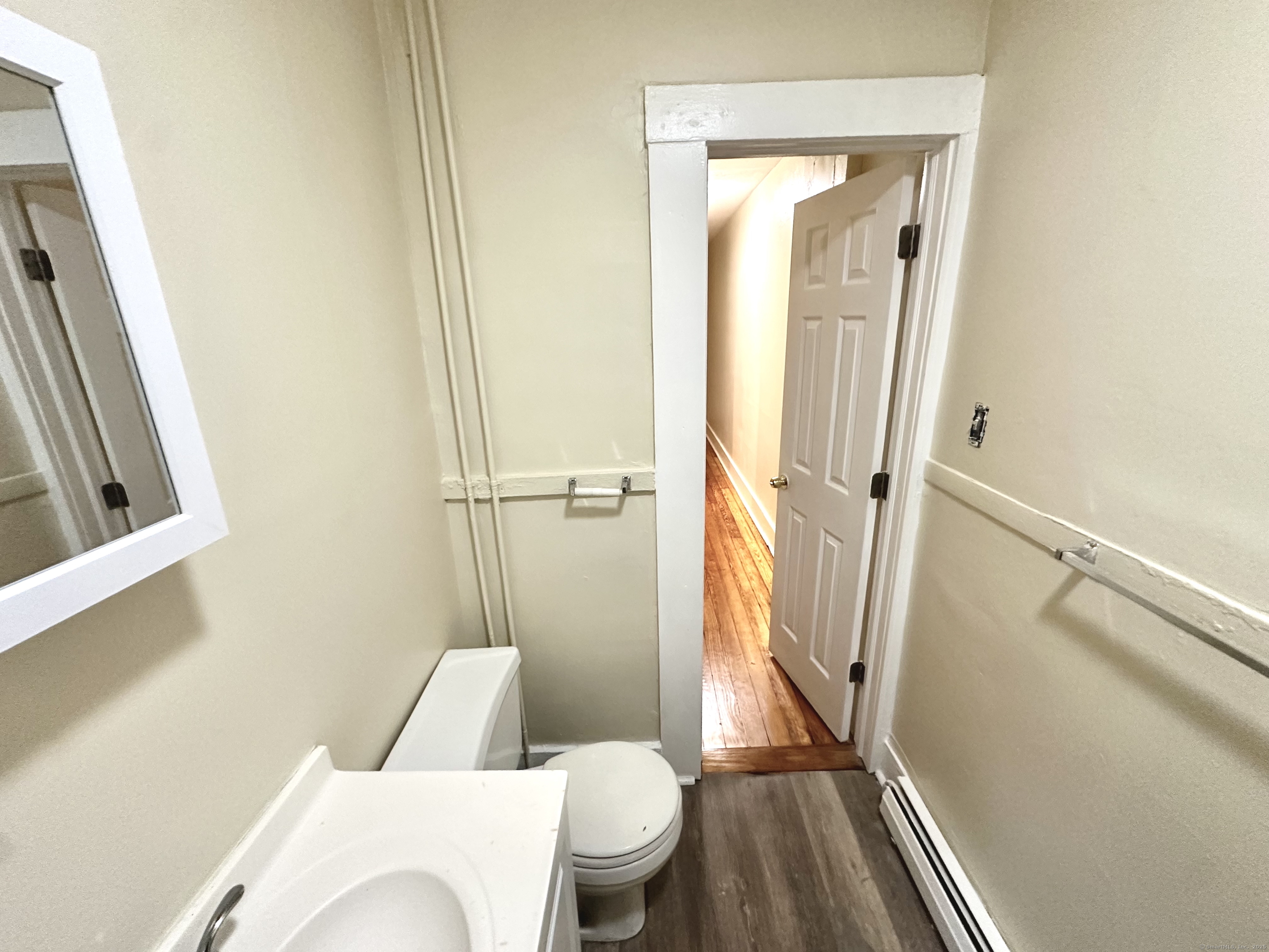 1019 West Main Street, Unit 3R Waterbury, CT 06708 - Photo 17 of 25 a bathroom with a toilet and a shower