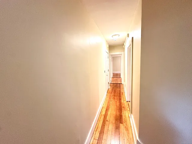 a view of a bathroom with a bathtub