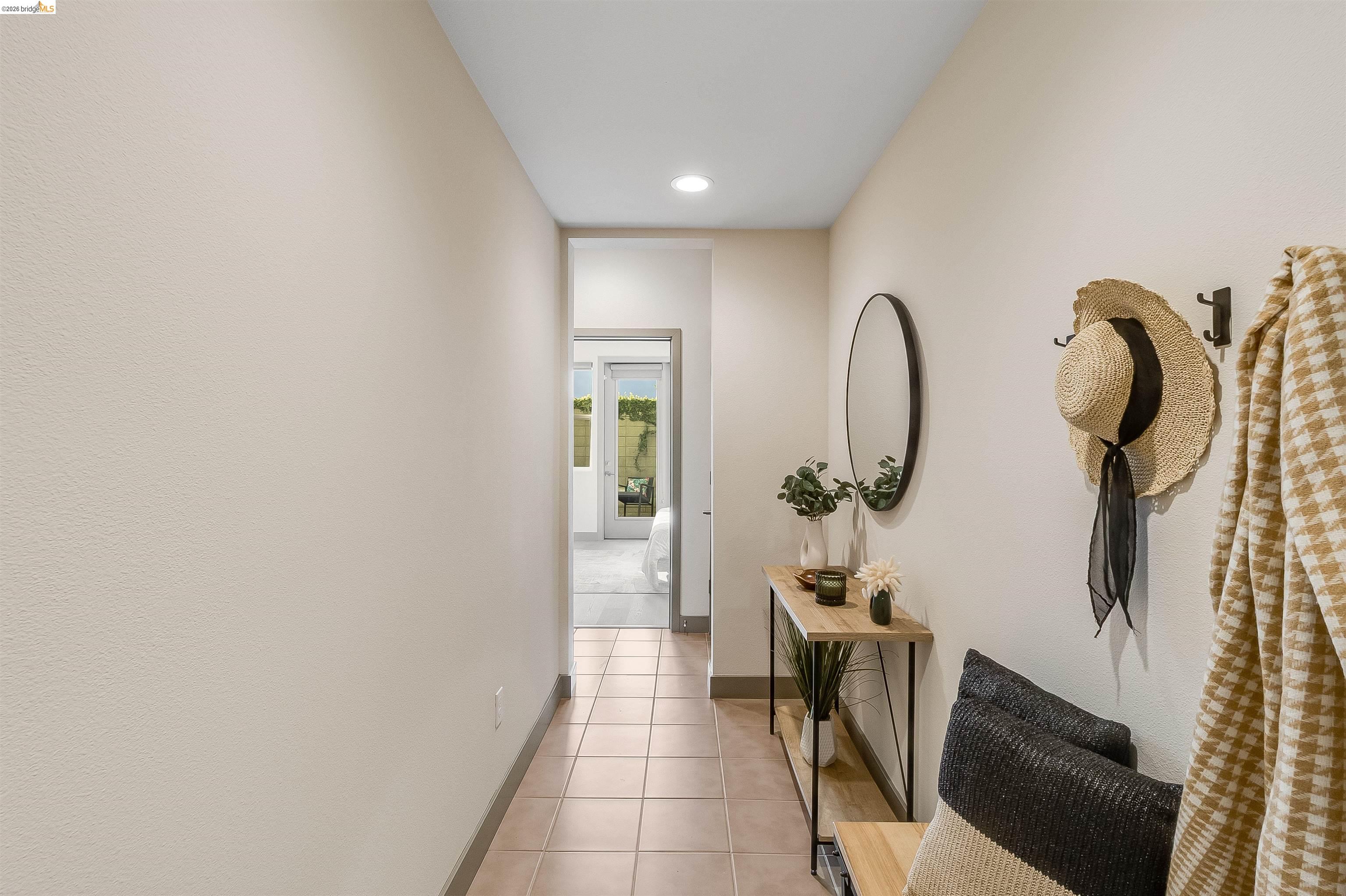 1357 Pullman Way Oakland, CA 94607 - Photo 4 of 37 Hallway featuring recessed lighting, tile flooring, and light-toned walls