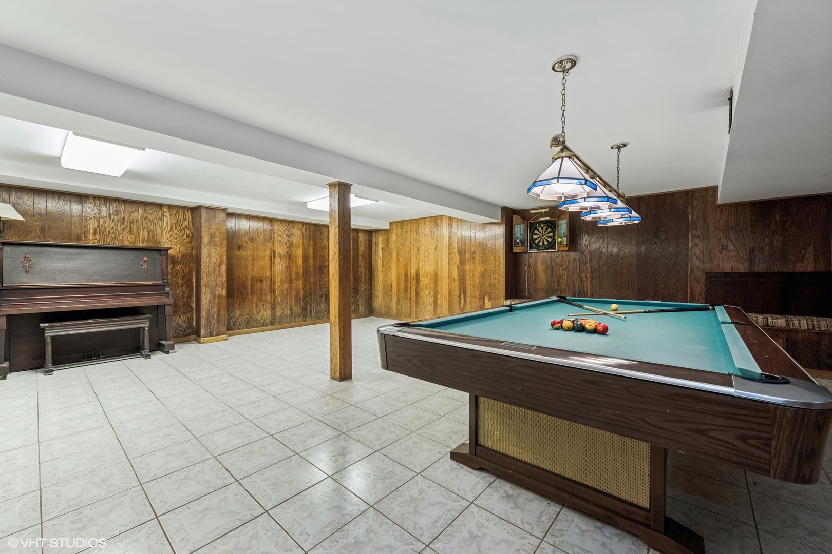143 Firth Road Inverness, IL 60067 - Photo 22 of 31 a room with pool table and a chandelier