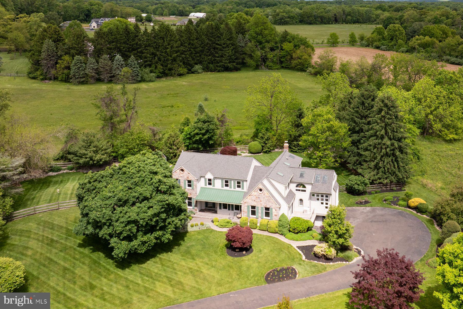 4009 Smoke Road Doylestown, PA 18902 - Photo 1 of 52 an aerial view of residential houses with outdoor space and lake view