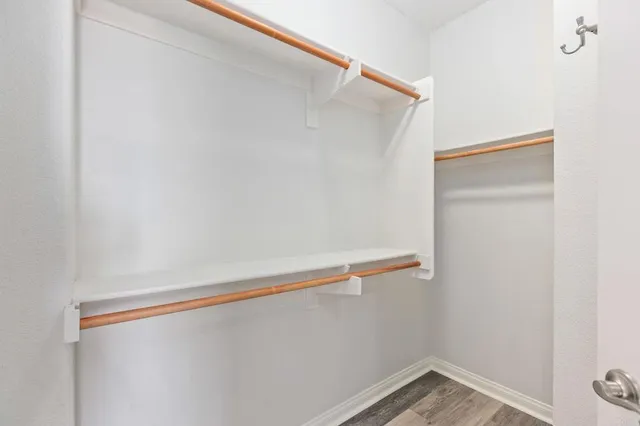 a view of room with racks on the wall