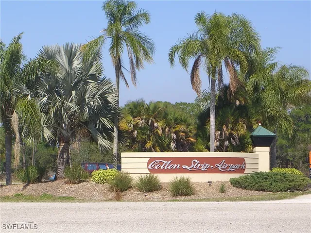 a sign that is on the side of a road