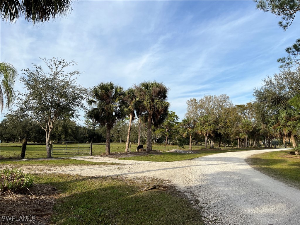 Sr-80 LaBelle, FL 33935 - Photo 6 of 8 a view of a playground with basketball court