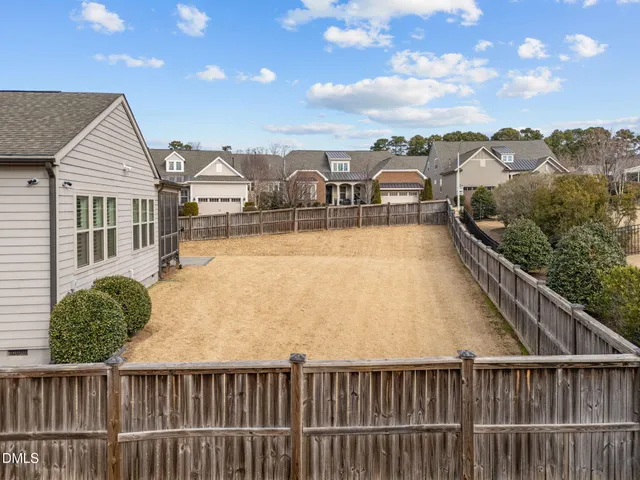 a view of a house with roof deck front of house
