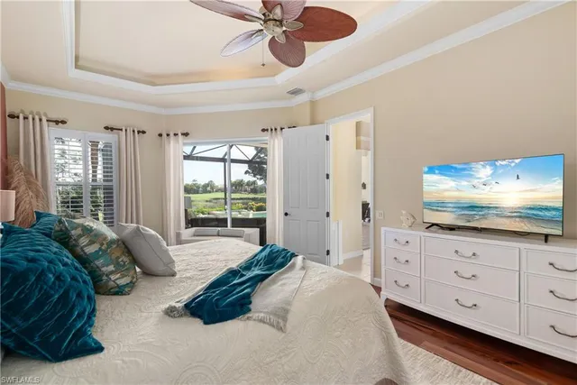 a spacious bedroom with a bed and window