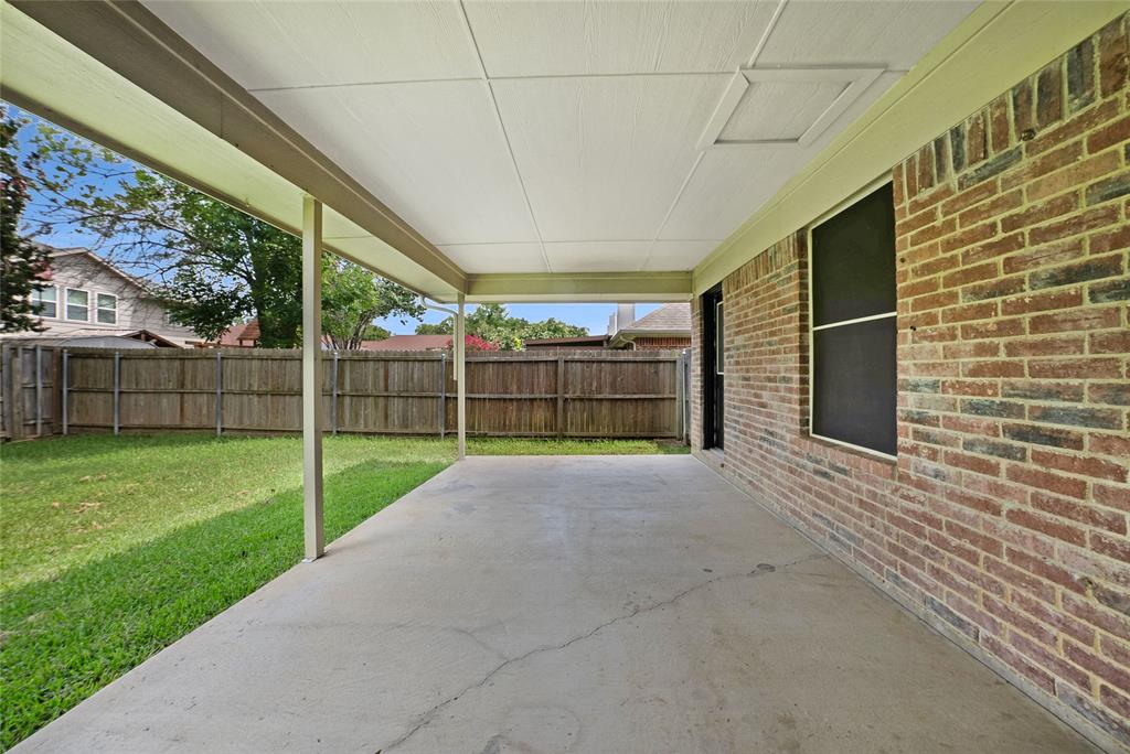 2910 Chisholm Trail Corinth, TX 76210 - Photo 28 of 30 a view of a backyard