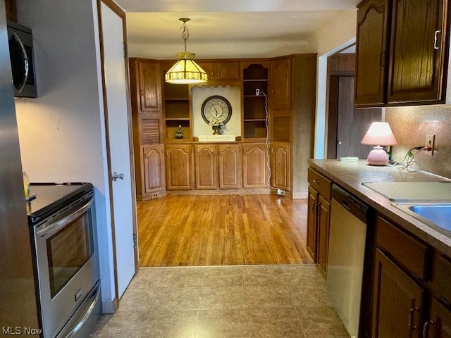 5772 Highland Road Cleveland, OH 44143 - Photo 6 of 33 Kitchen looking into Dining Room. Pantry door on left.