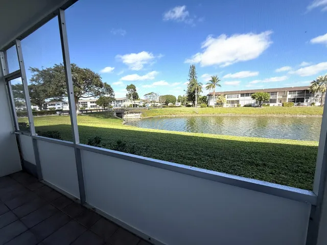 a view of a lake with a big yard