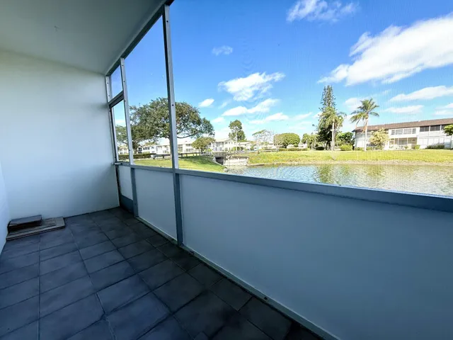 a view of a balcony with an outdoor space