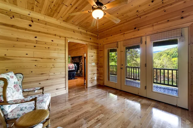 a bed sitting in a room next to a window