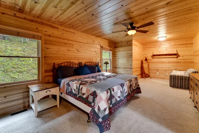 a bathroom with a tub and a sink