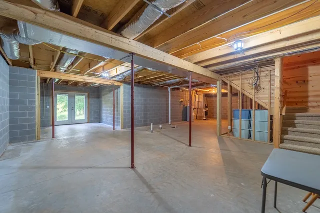 a view of a room with wooden walls