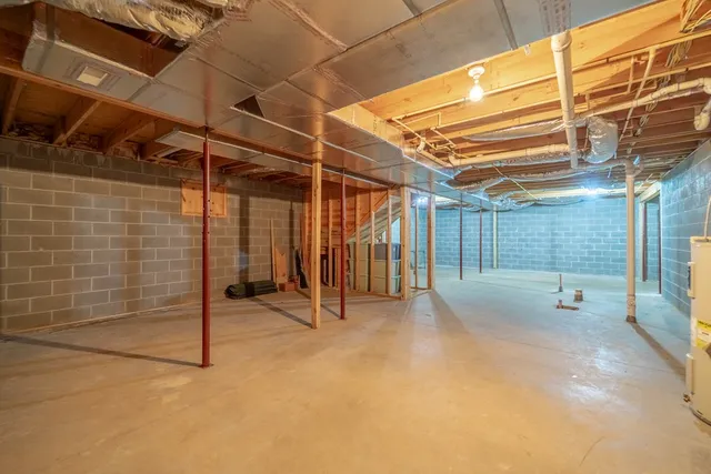 an aerial view of a house with pool ocean view