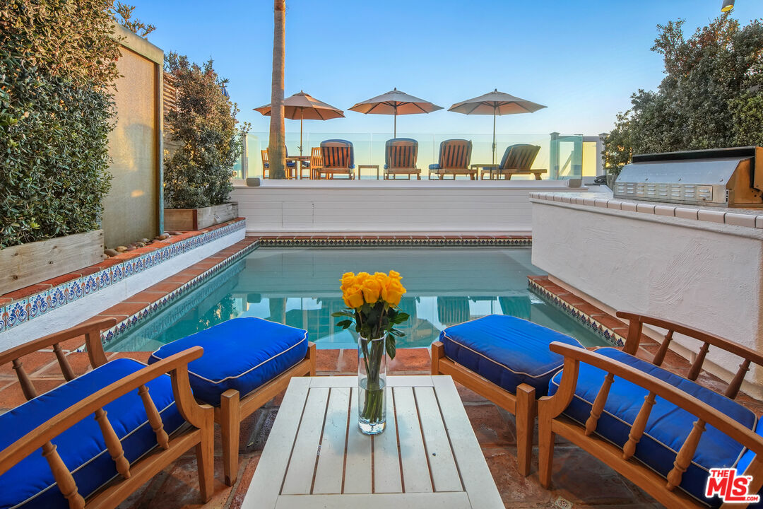 23422 Malibu Colony Road, Unit 98 Malibu, CA 90265 - Photo 11 of 53 a view of a chairs and table in the balcony