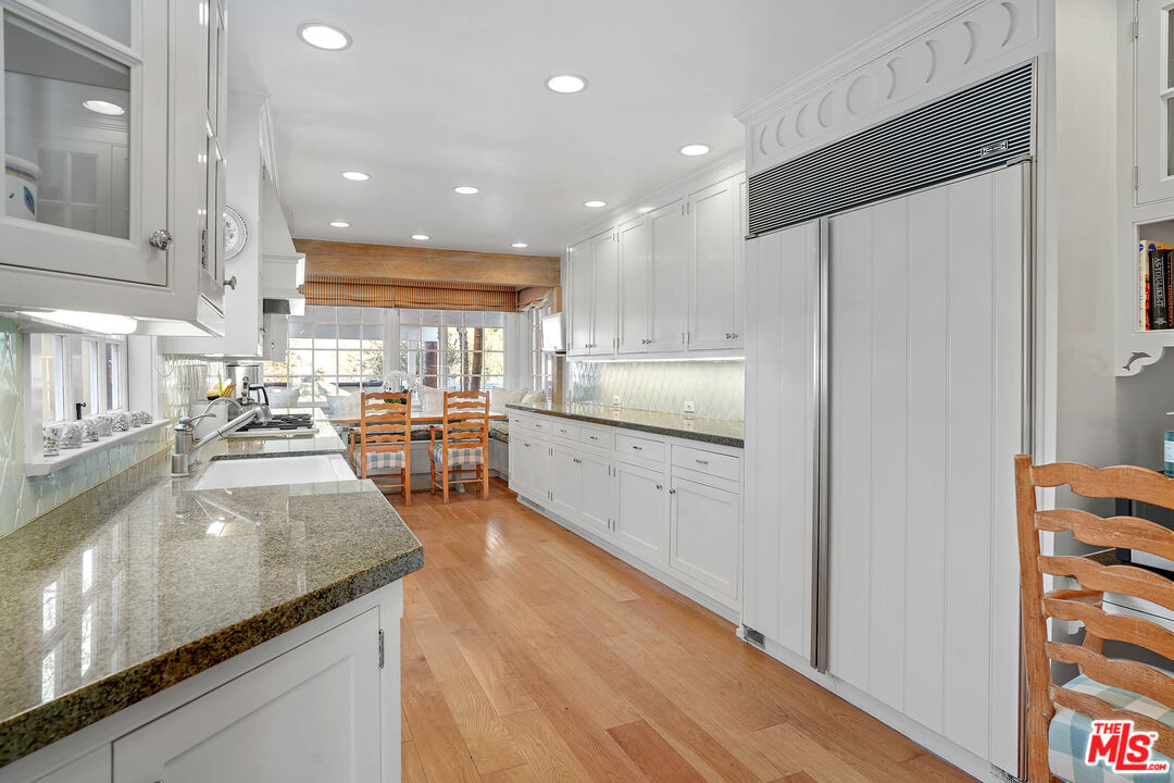 23422 Malibu Colony Road, Unit 98 Malibu, CA 90265 - Photo 15 of 53 a large kitchen with stainless steel appliances and a large counter top