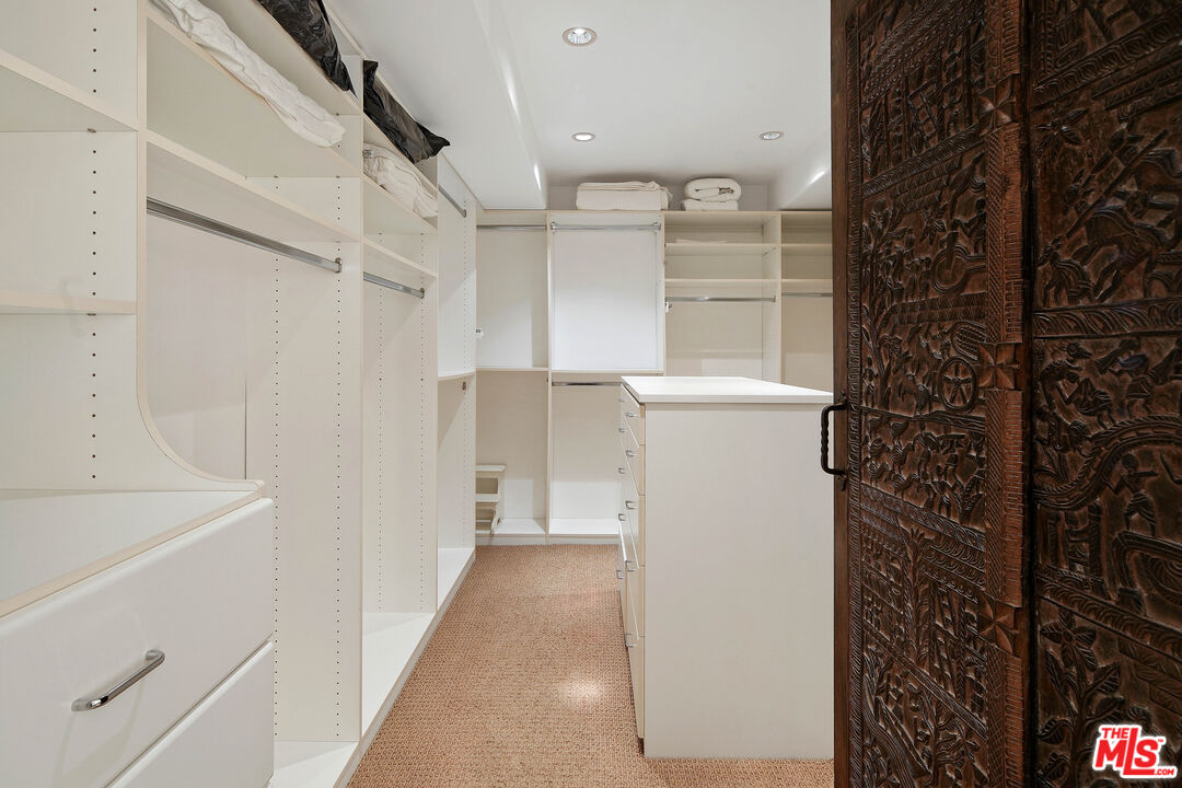 23422 Malibu Colony Road, Unit 98 Malibu, CA 90265 - Photo 26 of 53 a view of a storage & utility room with a refrigerator