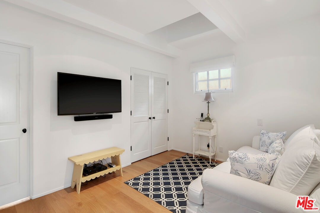 23422 Malibu Colony Road, Unit 98 Malibu, CA 90265 - Photo 28 of 53 a living room with furniture and a flat screen tv