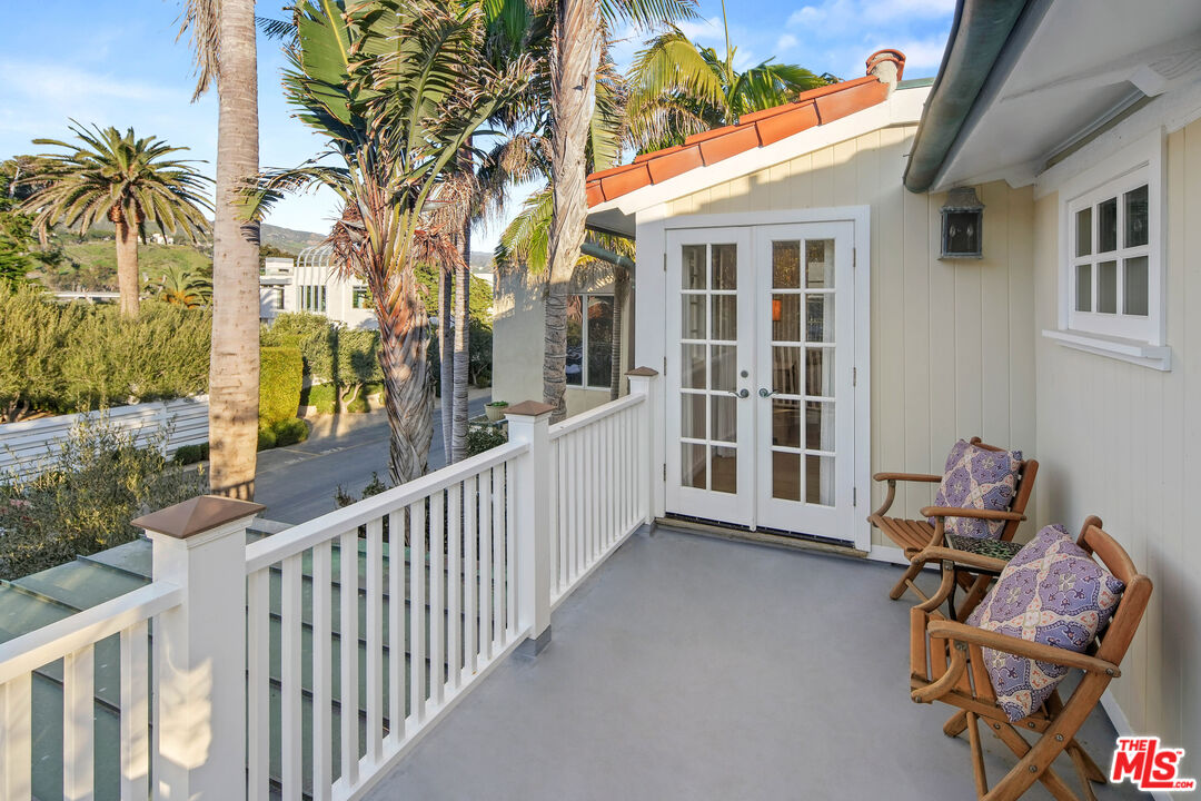23422 Malibu Colony Road, Unit 98 Malibu, CA 90265 - Photo 30 of 53 a view of a house with backyard and sitting area
