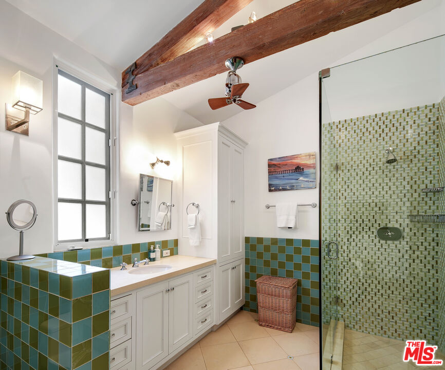 23422 Malibu Colony Road, Unit 98 Malibu, CA 90265 - Photo 32 of 53 a bathroom with a double vanity sink mirror and shower